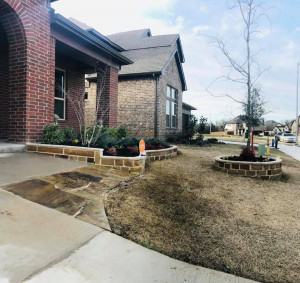 Custom Stonework Porch Extension and Landscape Border