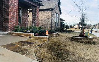 Custom Stonework Porch Extension and Landscape Border