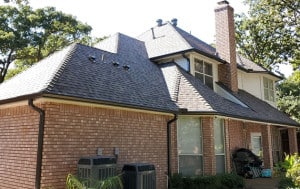 New Class 4 Shingle Roof and New Rain Gutters on House
