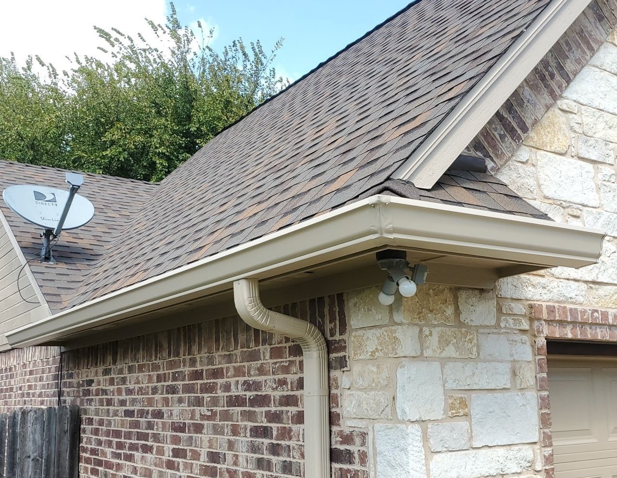 Seamless Aluminum Rain Gutters Installed on Home